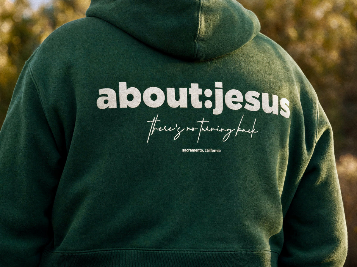 about:jesus Sun Fade raw-edge tee in navy — Sacramento, California.